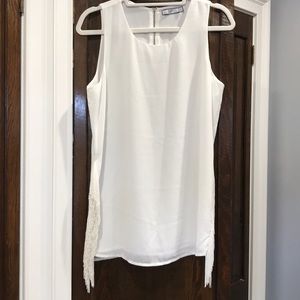 Women’s top. Large.  Never worn. Runs small.